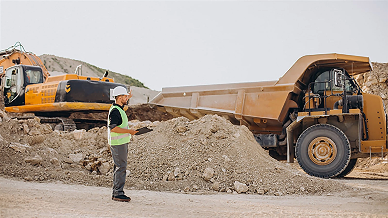 male-worker-with-bulldozer-sand-quarry